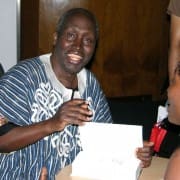 Ngũgĩ_wa_Thiong’o_(signing_autographs_in_London)